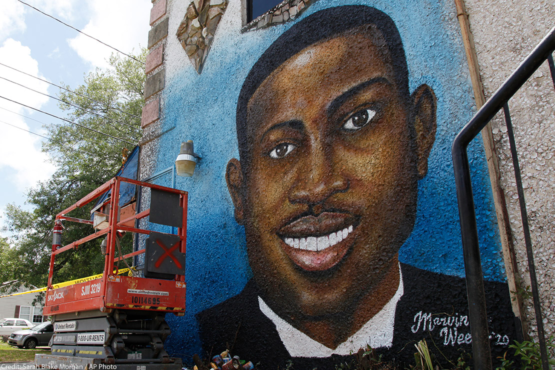 Painted mural of Ahmaud Arbery in Brunswick, Georgia after he was shot and killed in February 2020.