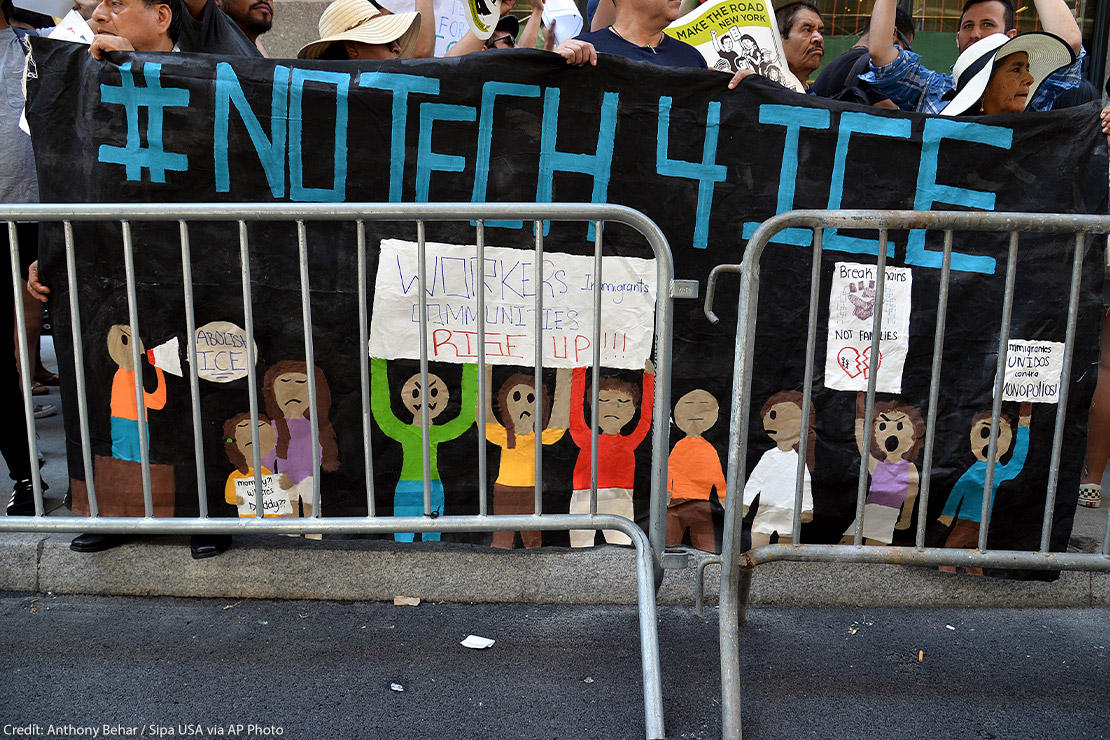 Demonstrators hold banner that reads "#NoTech4Ice"outside Jeff Bezos, CEO of Amazon, Manhattan apartment to protest Amazon technology being used by the Department of Homeland Security.