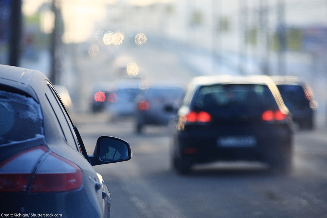 Cars driving on a highway.