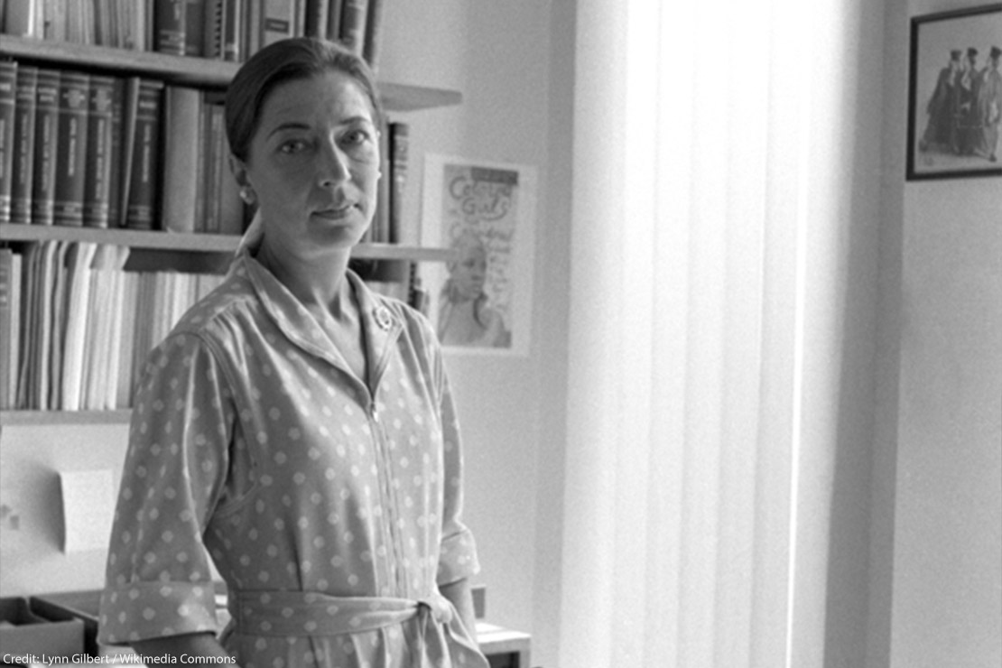 Ruth Bader Ginsberg standing in an office, 1977