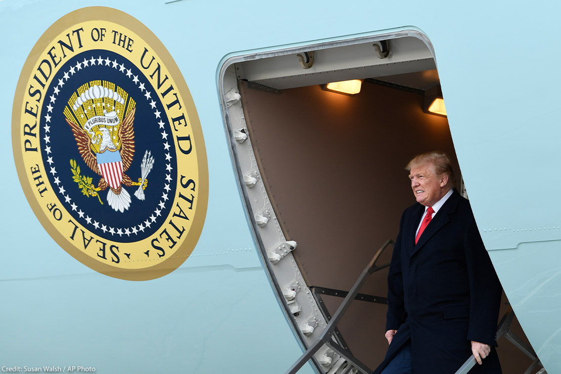 President Donald Trump walks down the steps of Air Force One at Andrews Air Force Base in Maryland.