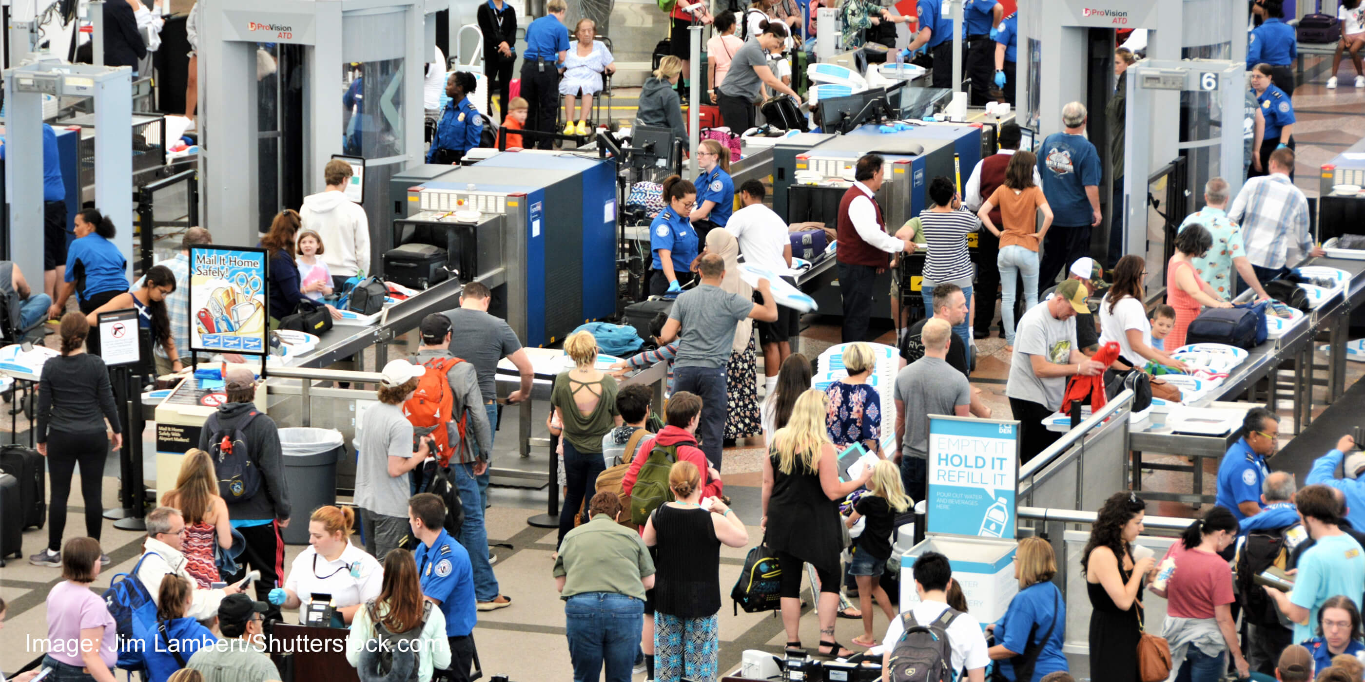 Travelers waiting in long lines to pass through the Transportation Security Administrations (TSA) security screening areas to get to their flights.