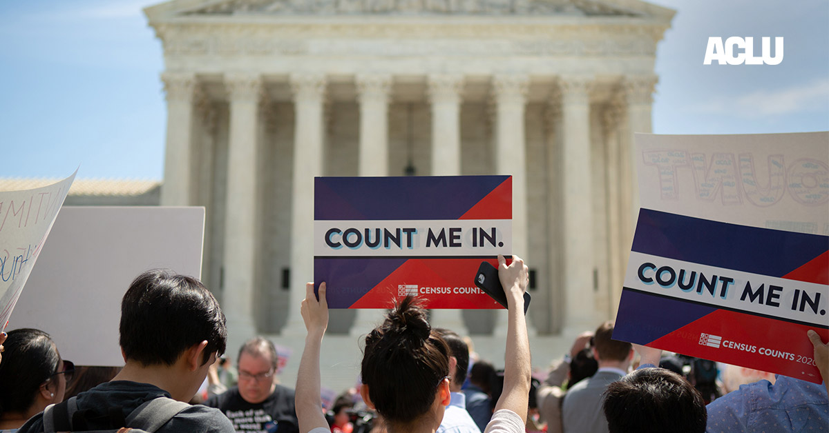 Demonstrators marching against adding a question regarding citizenship to the Census