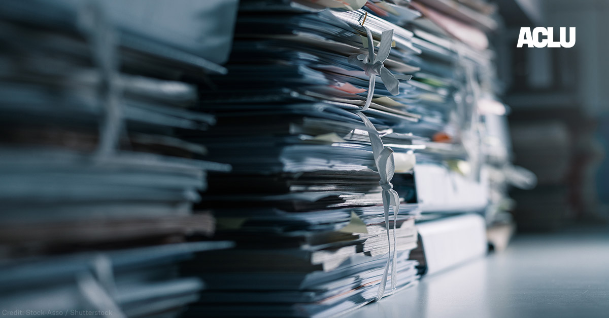 Stacks of files in a dark office