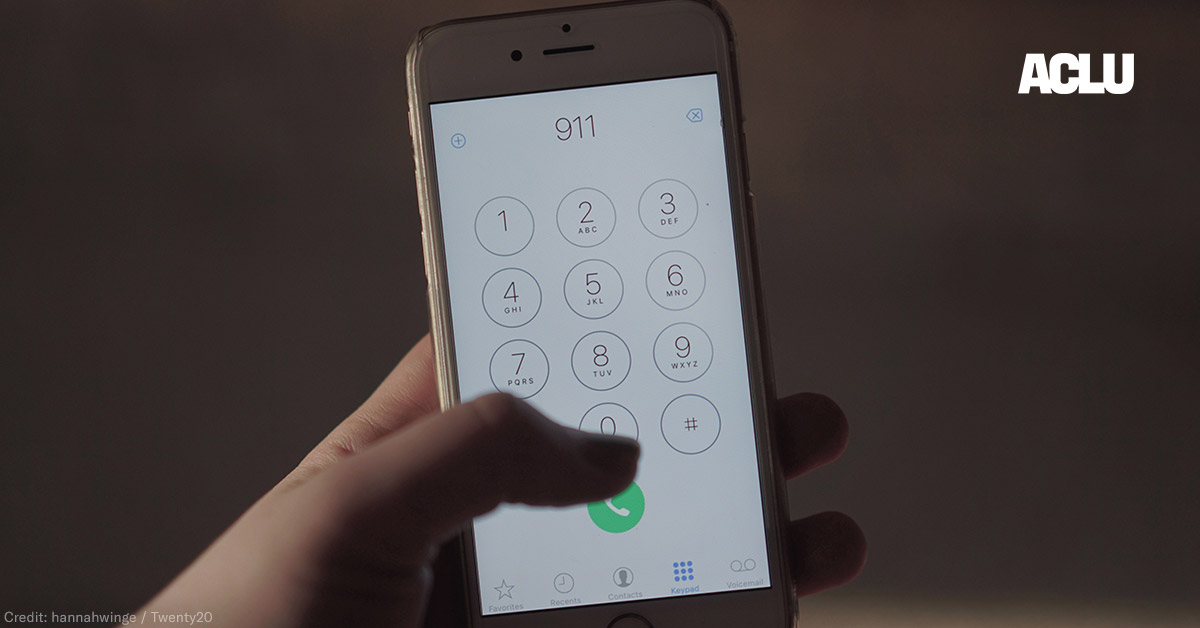 Close up of a hand dialing 911 on a cell phone