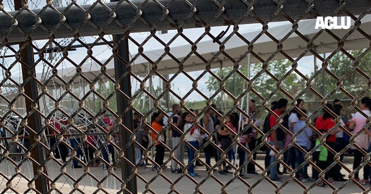 Families at the border through fence