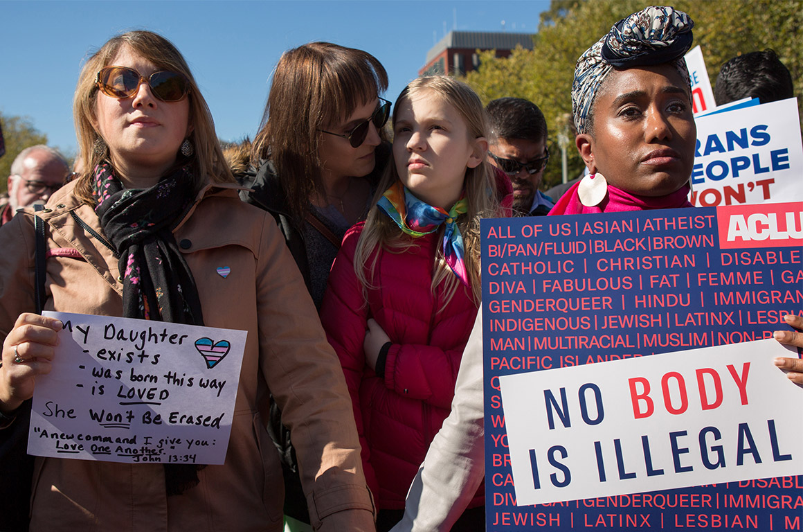 Protesters marching in favor of the rights of trans people