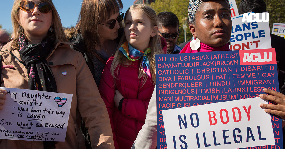 Protesters marching in favor of the rights of trans people