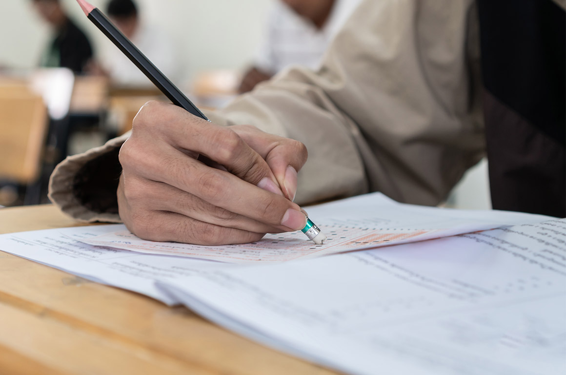 A student erasing answers from a test